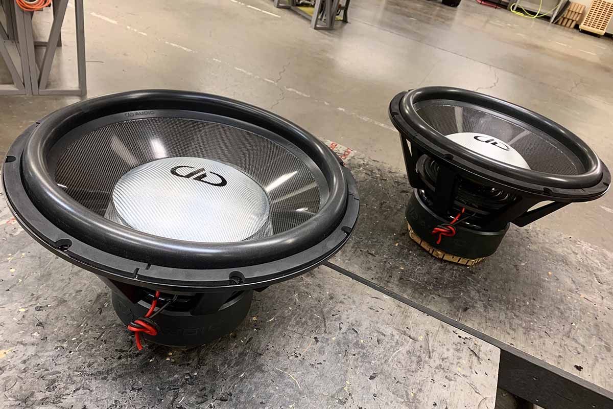Two USA Made Subwoofers with silver dust caps, high gloss carbon fiber cones, and black DDA logos
