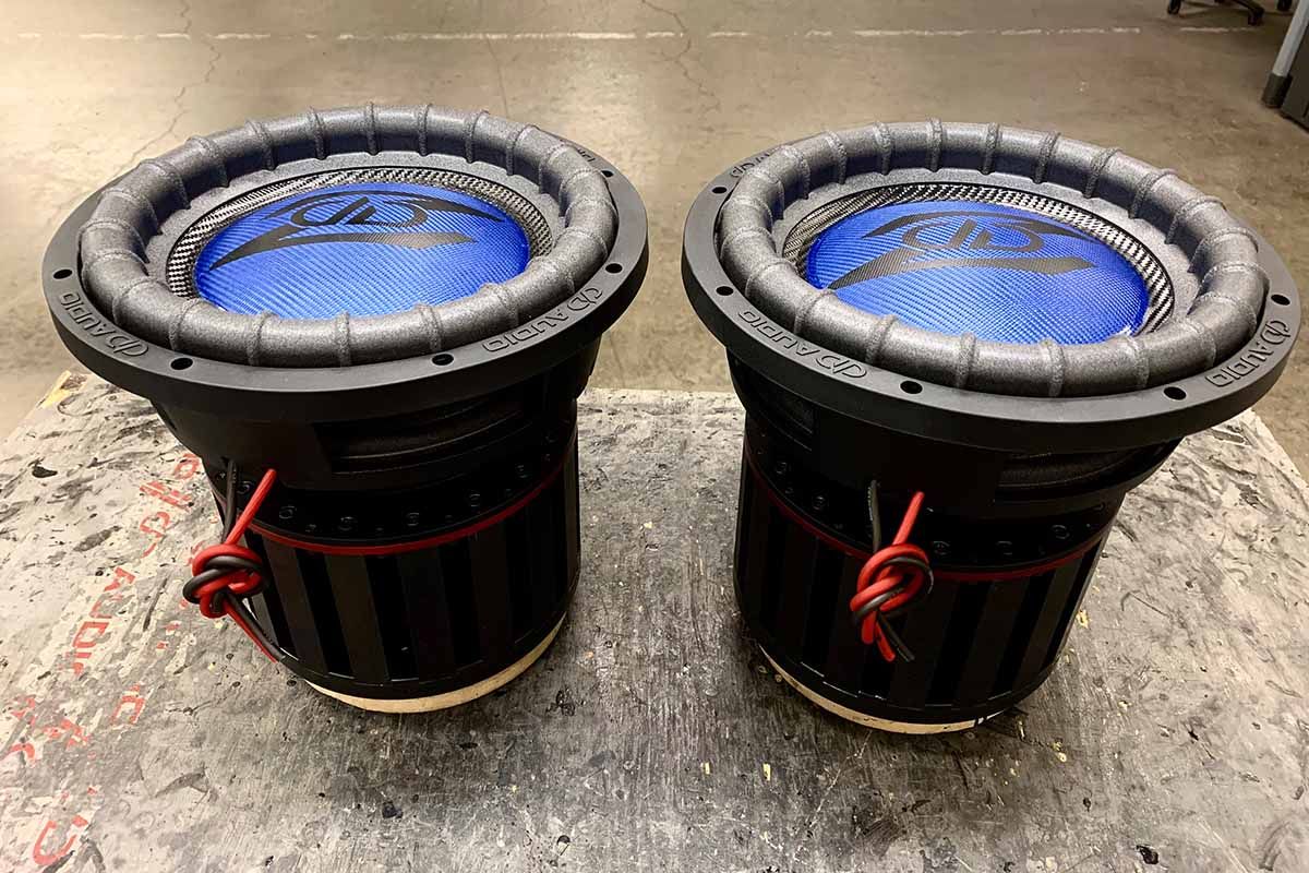 USA Made Subwoofers with electric blue dust caps, and black DD Z logos