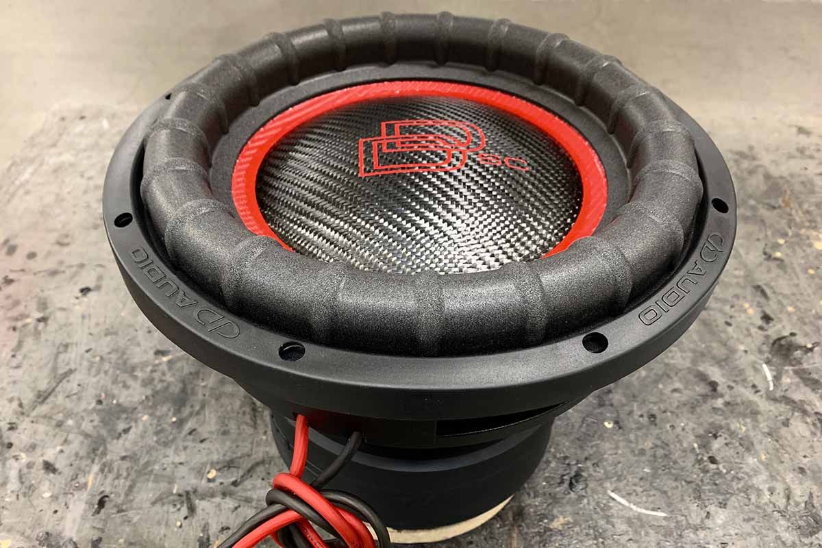 USA Made Subwoofer with red cone, black dust cap, red DD Classic logo and red Super Charged decal