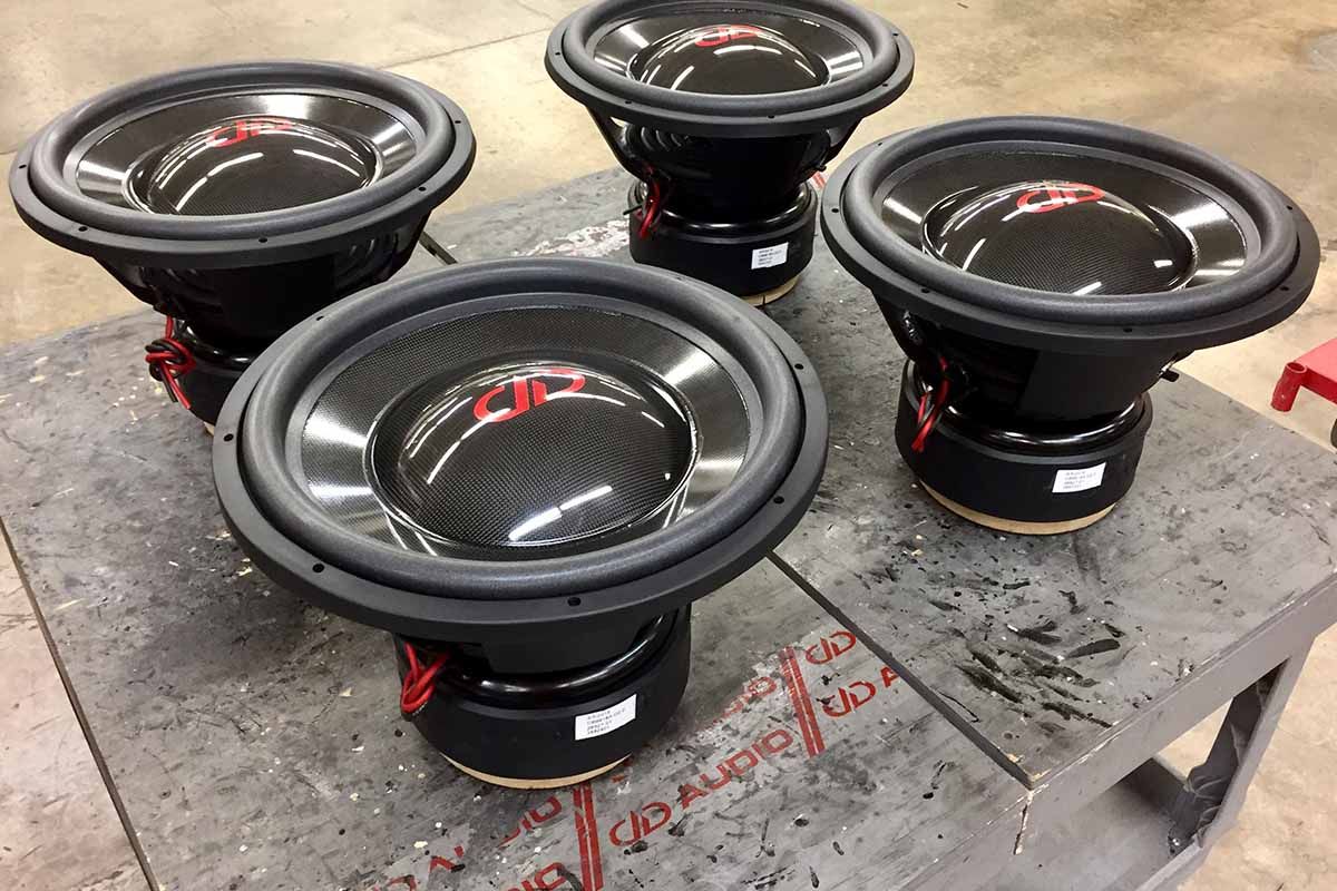 Four USA Made Subwoofers with high gloss carbon fiber cones and dust caps with Red DDA logos
