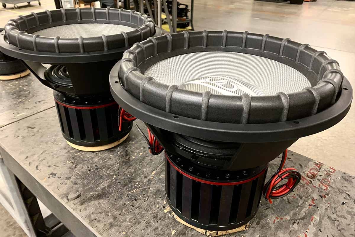 Two USA Made subwoofers with silver cones, silver dust caps and white DD Z logos