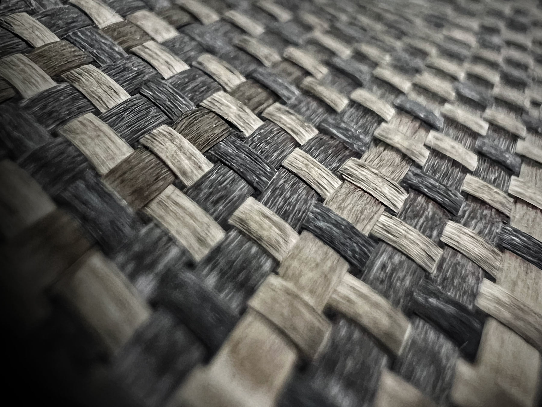 Stylized close up of carbon fiber weave