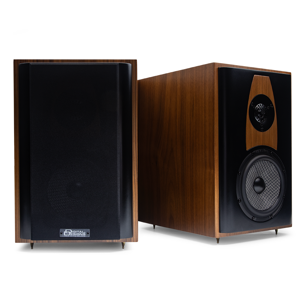 Photo of two LSS-161 - one facing front with magnetic cover in place, the other shot front angle right to show left side of cabinet, woofer, tweeter and baffle